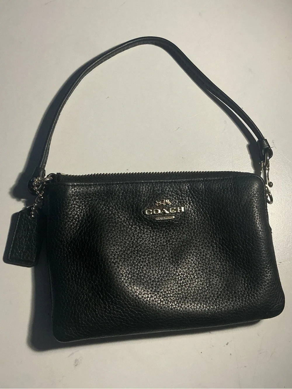 Coach Black Pebbled Leather Wristlet with Silver Logo